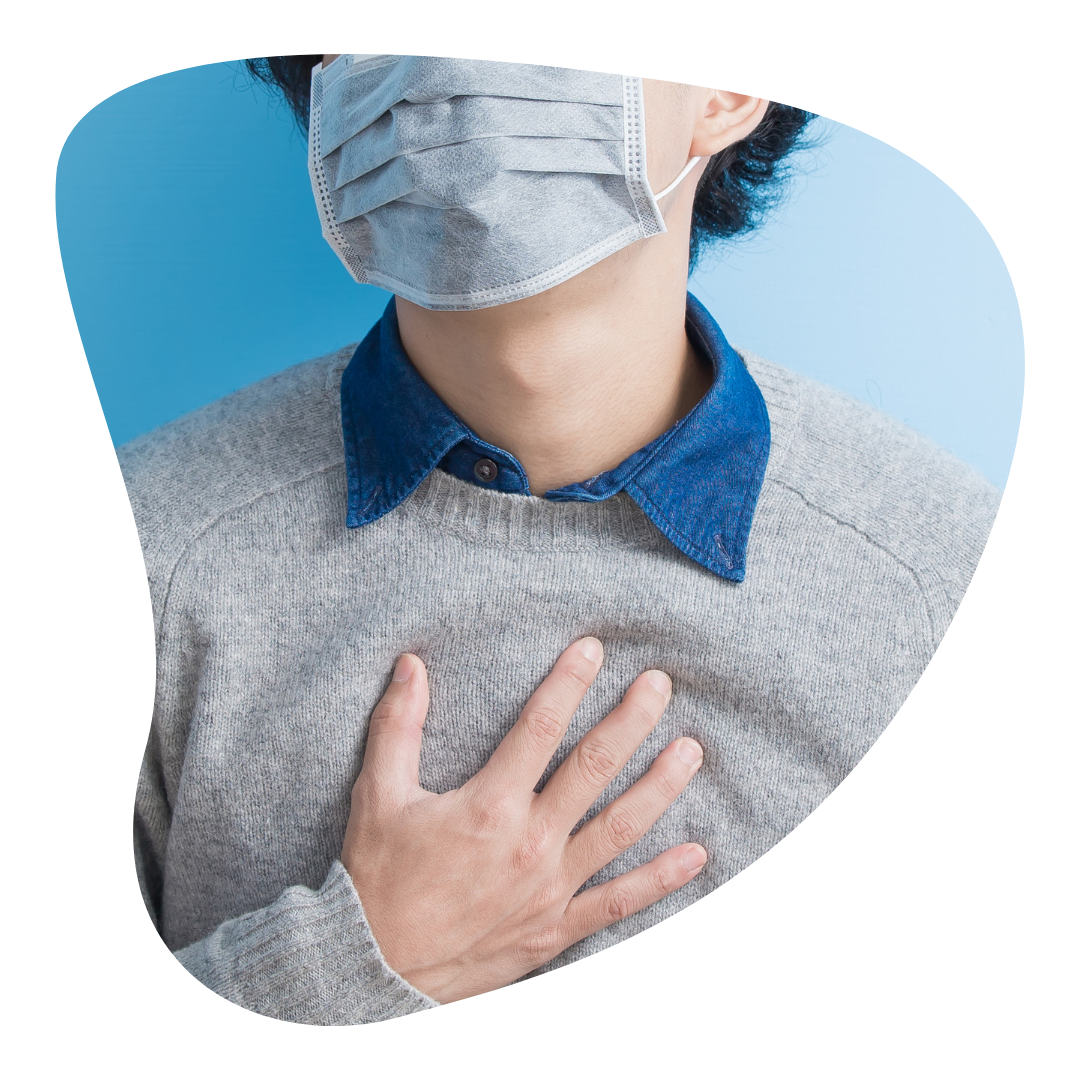 Do I have anxiety? | A person touches their chest. A common symptom of anxiety is heart pain or palpitations.