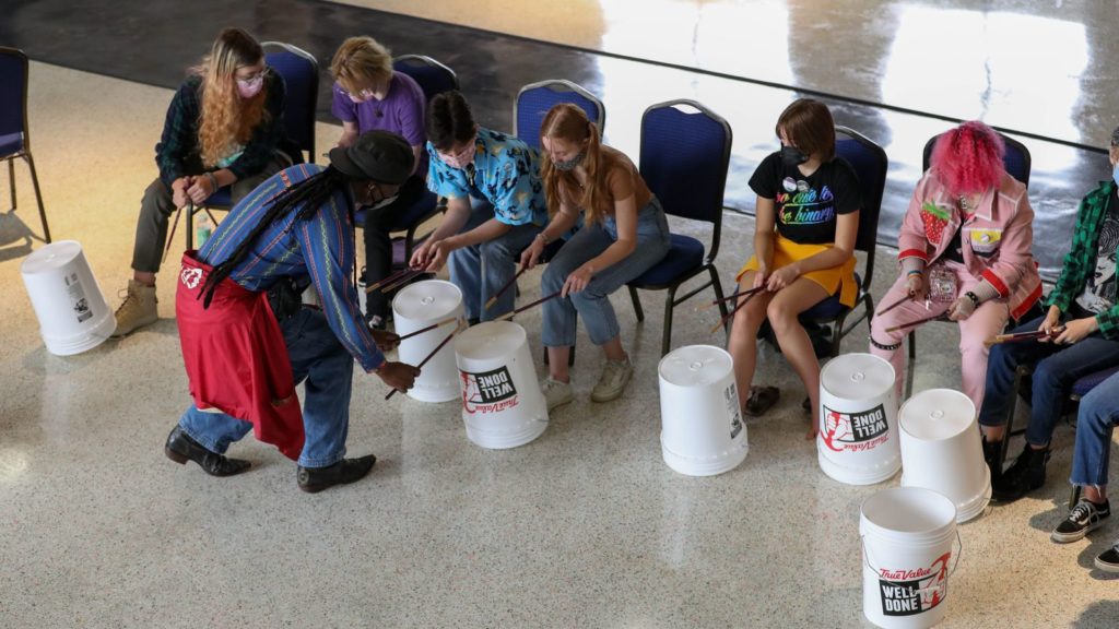 Teens started slowly then warmed up to an energetic bucket-drumming session, a way to get them working together during a week-long LGBTQ+ camp at Allendale United Methodist Church in St. Petersburg.