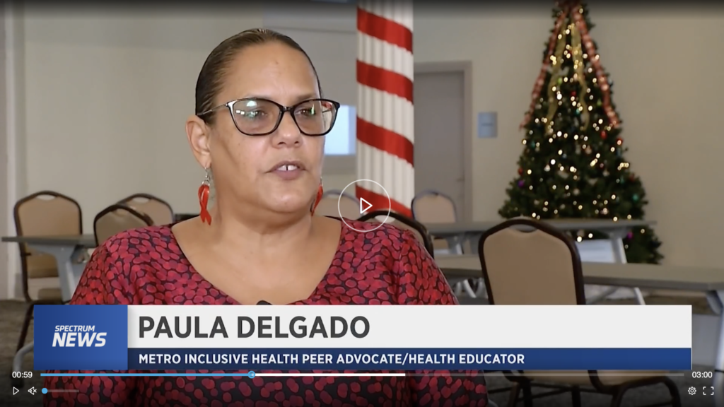 Local HIV Advocate Paula Delgado with Metro Inclusive Health on World AIDS Day